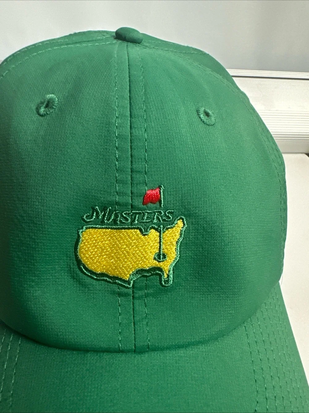 Masters Green Baseball Cap with Yellow & Red Embroidered Logo